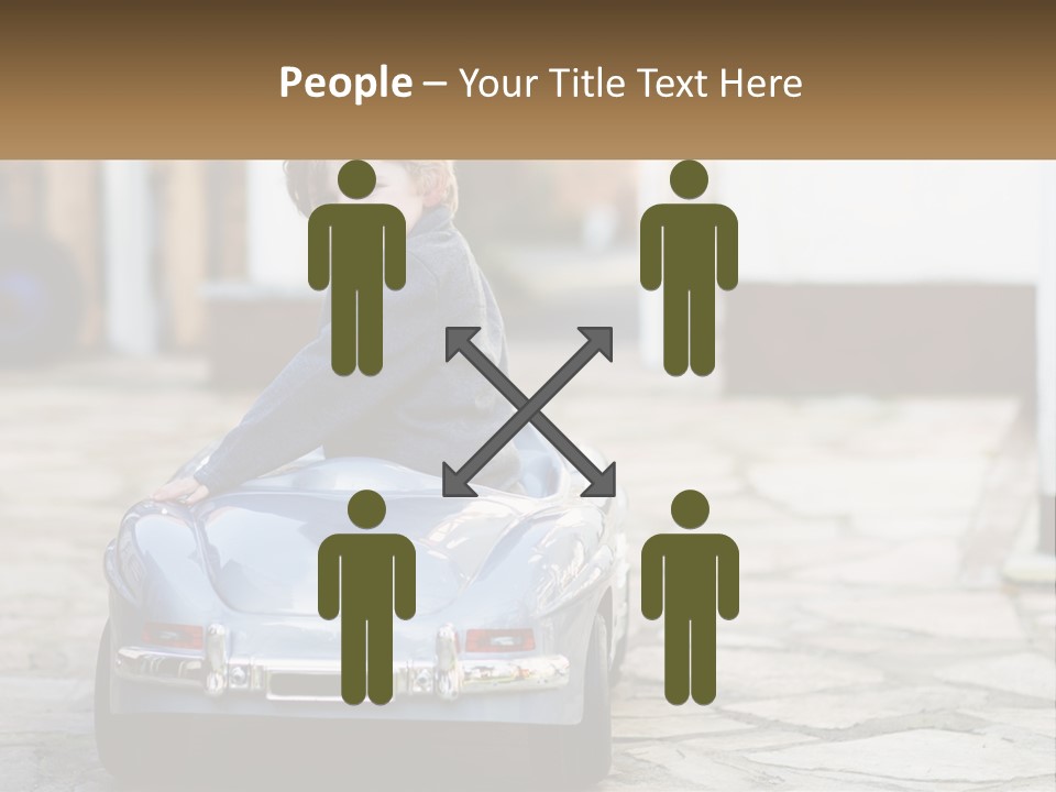 A Young Boy Is Sitting In A Toy Car PowerPoint Template