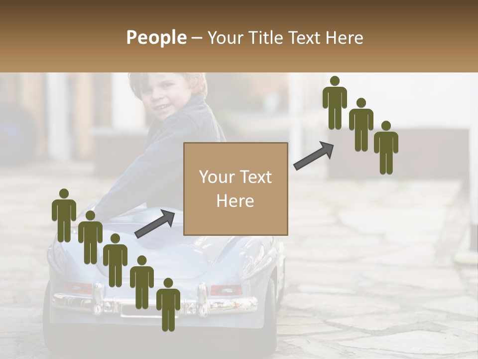 A Young Boy Is Sitting In A Toy Car PowerPoint Template