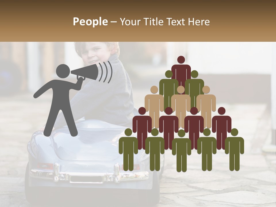 A Young Boy Is Sitting In A Toy Car PowerPoint Template