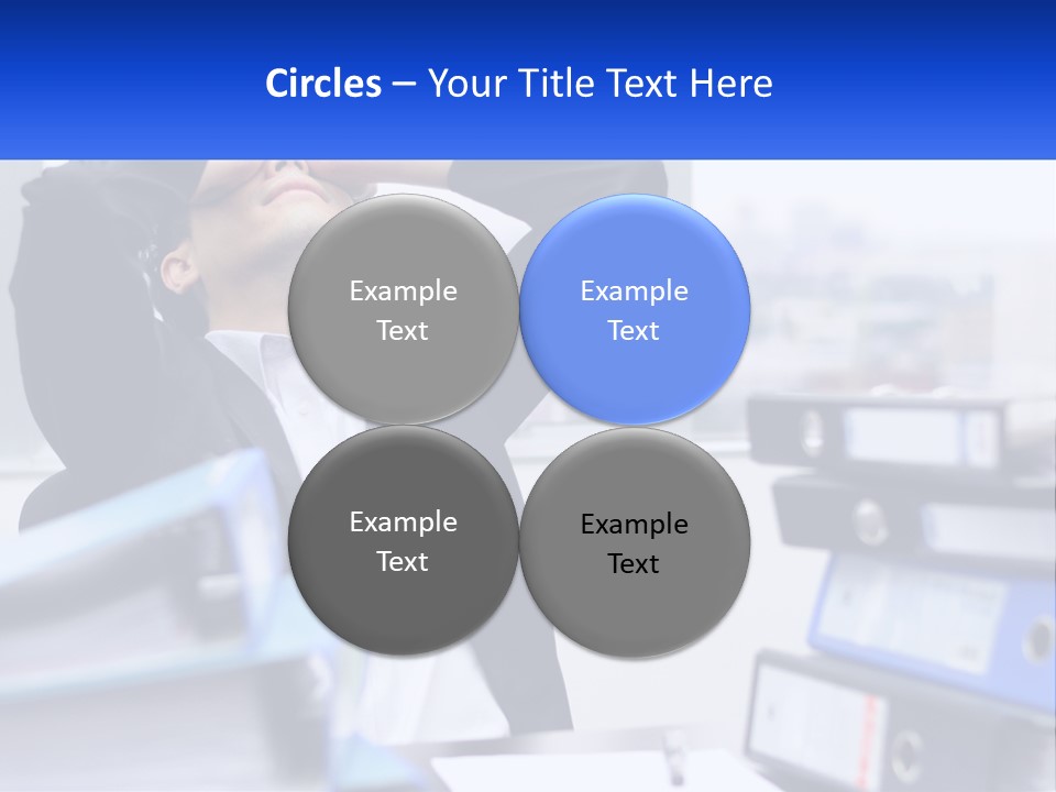 A Man Sitting At A Desk With His Head In His Hands PowerPoint Template