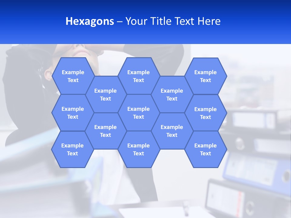 A Man Sitting At A Desk With His Head In His Hands PowerPoint Template