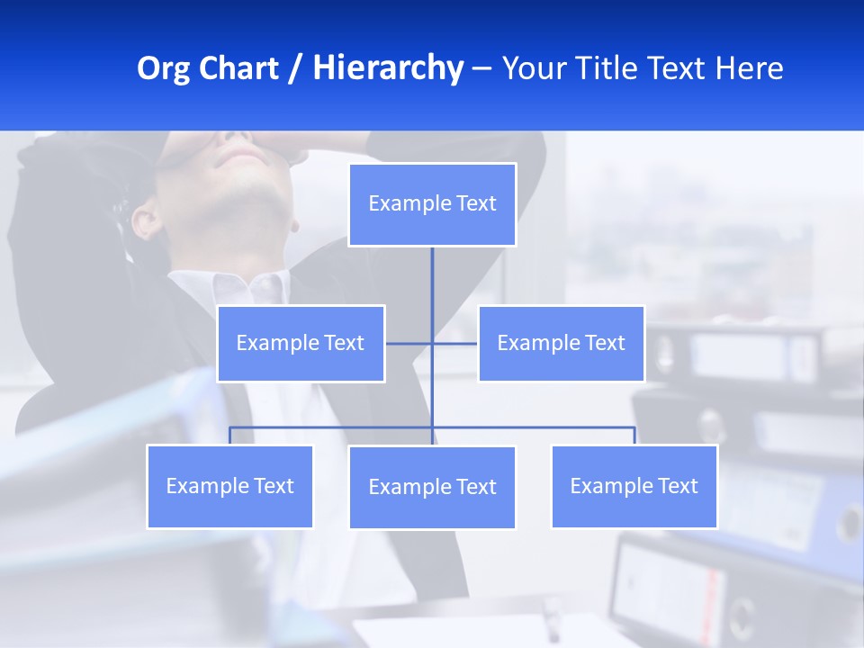 A Man Sitting At A Desk With His Head In His Hands PowerPoint Template