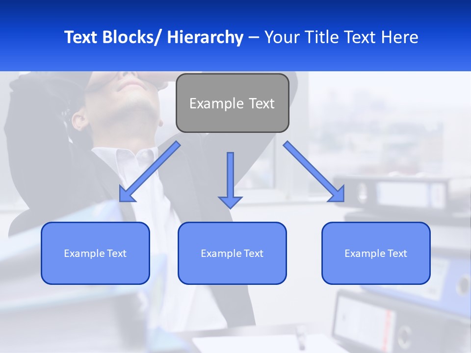 A Man Sitting At A Desk With His Head In His Hands PowerPoint Template