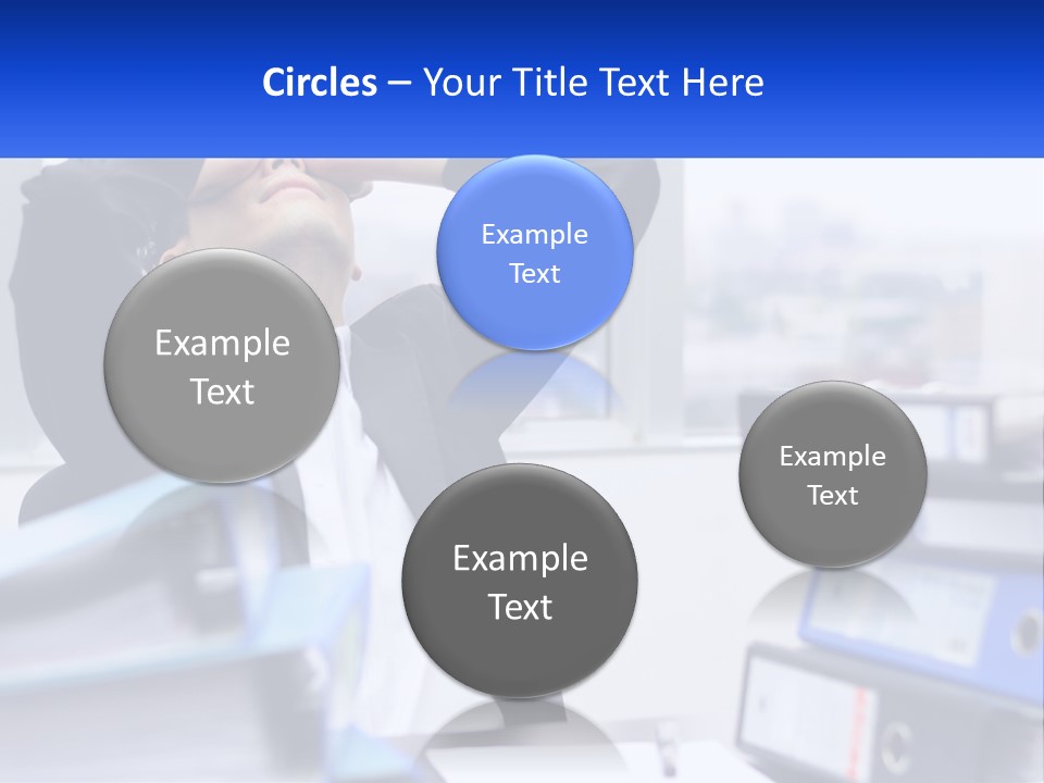 A Man Sitting At A Desk With His Head In His Hands PowerPoint Template