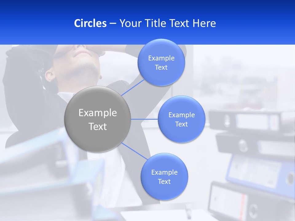 A Man Sitting At A Desk With His Head In His Hands PowerPoint Template