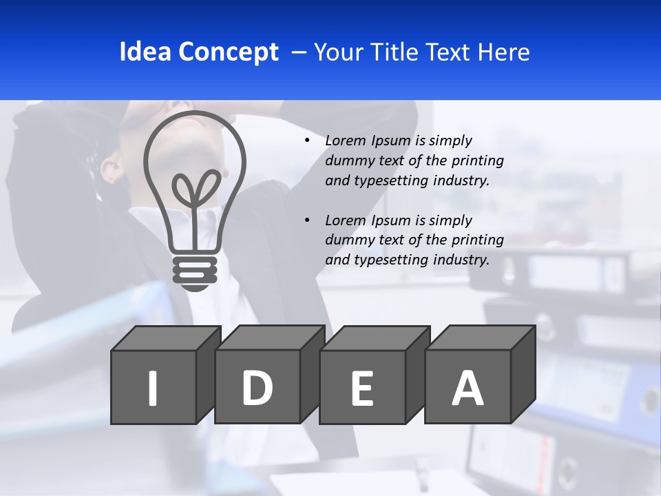 A Man Sitting At A Desk With His Head In His Hands PowerPoint Template