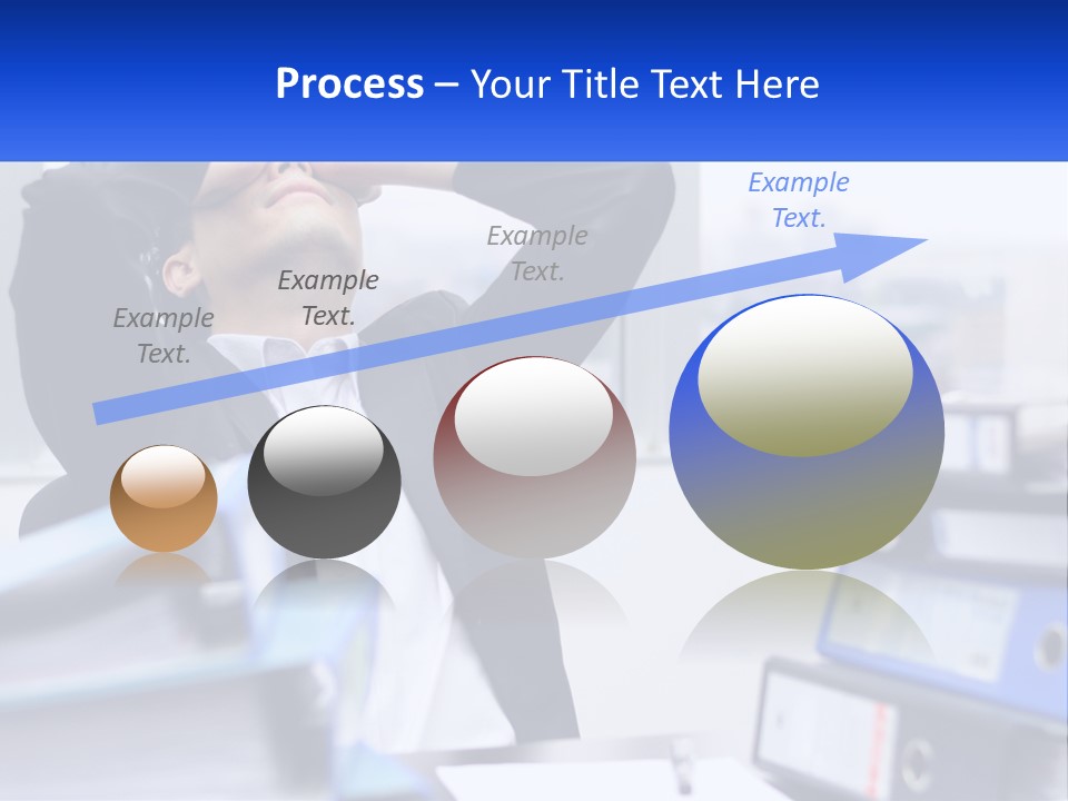 A Man Sitting At A Desk With His Head In His Hands PowerPoint Template