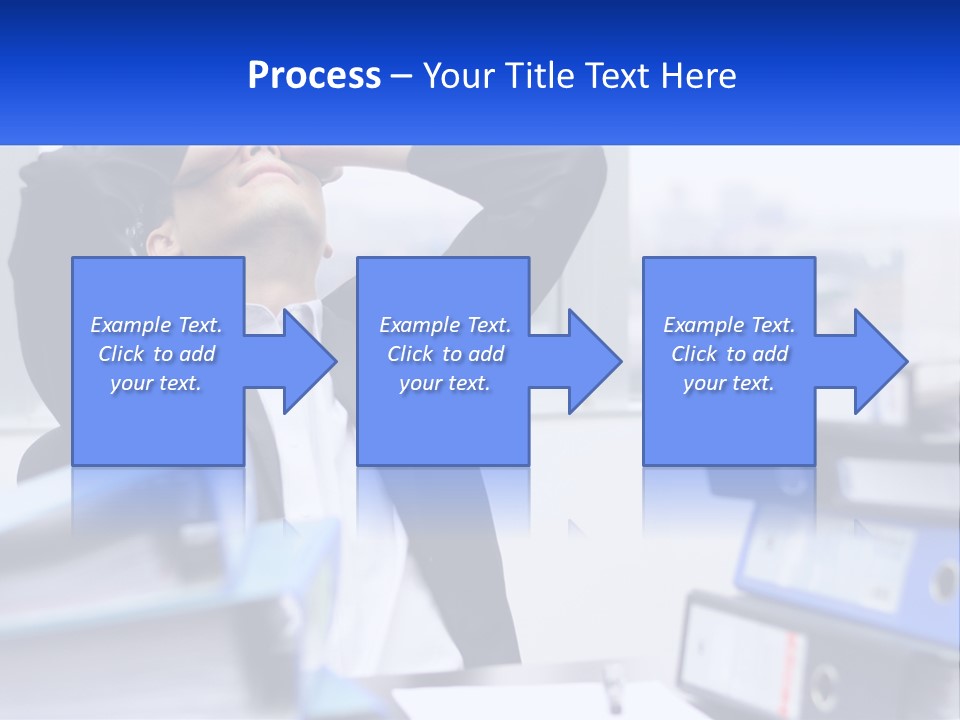A Man Sitting At A Desk With His Head In His Hands PowerPoint Template