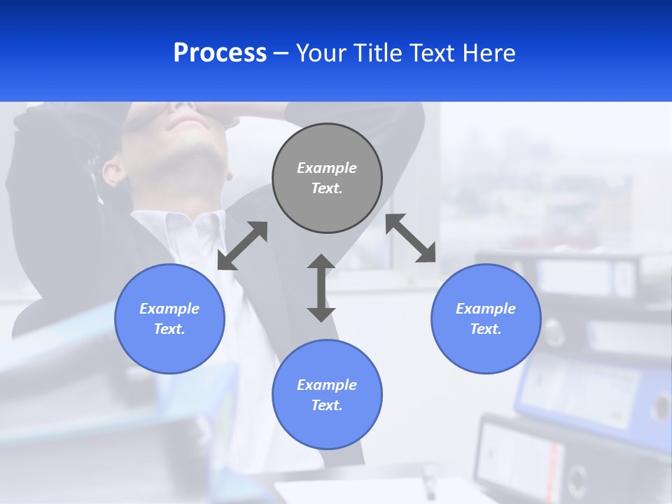 A Man Sitting At A Desk With His Head In His Hands PowerPoint Template