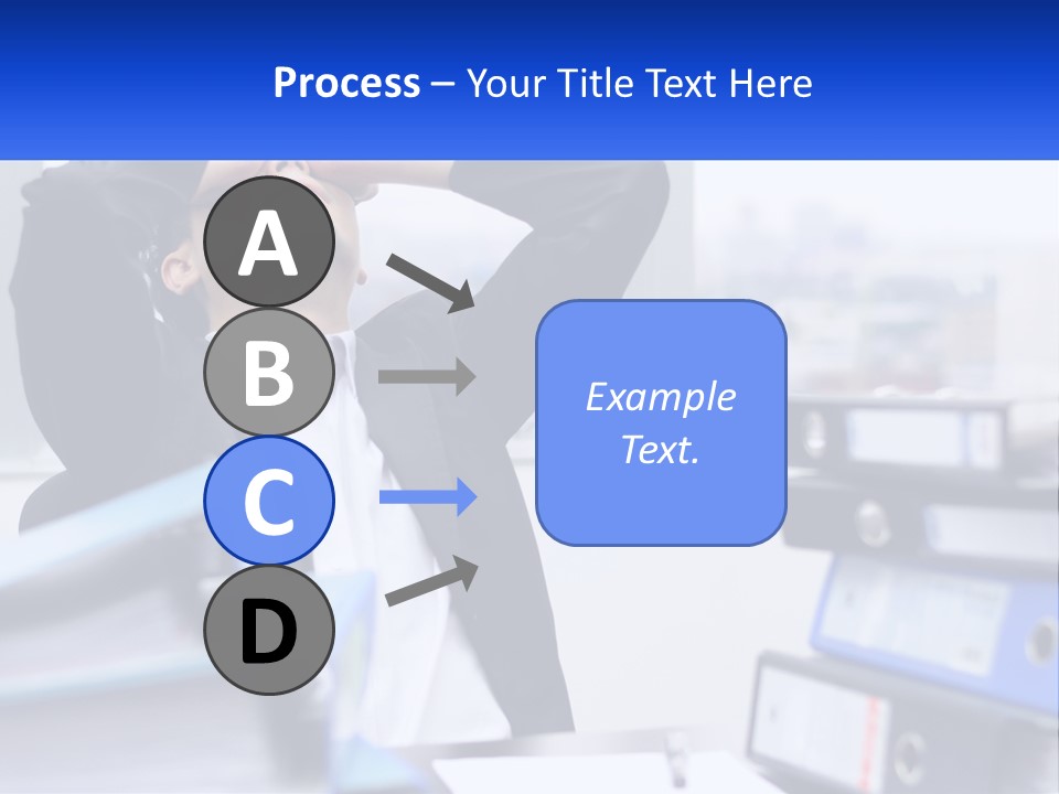 A Man Sitting At A Desk With His Head In His Hands PowerPoint Template