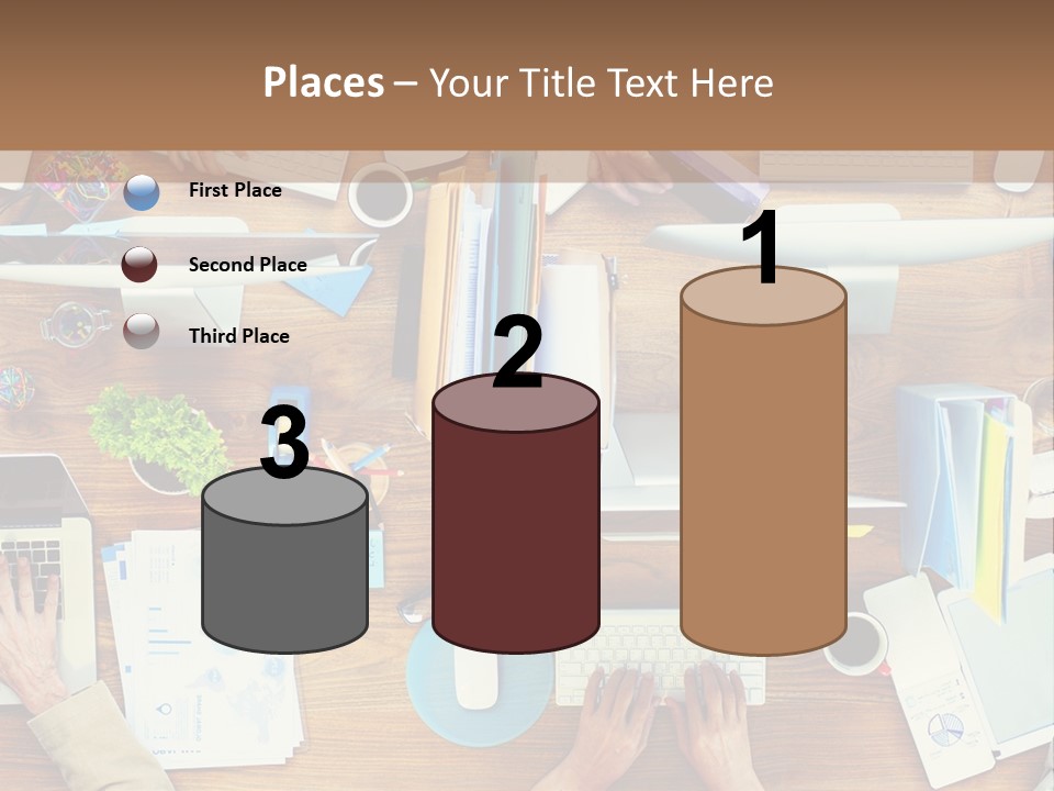 A Group Of People Sitting At A Table Working On Laptops PowerPoint Template