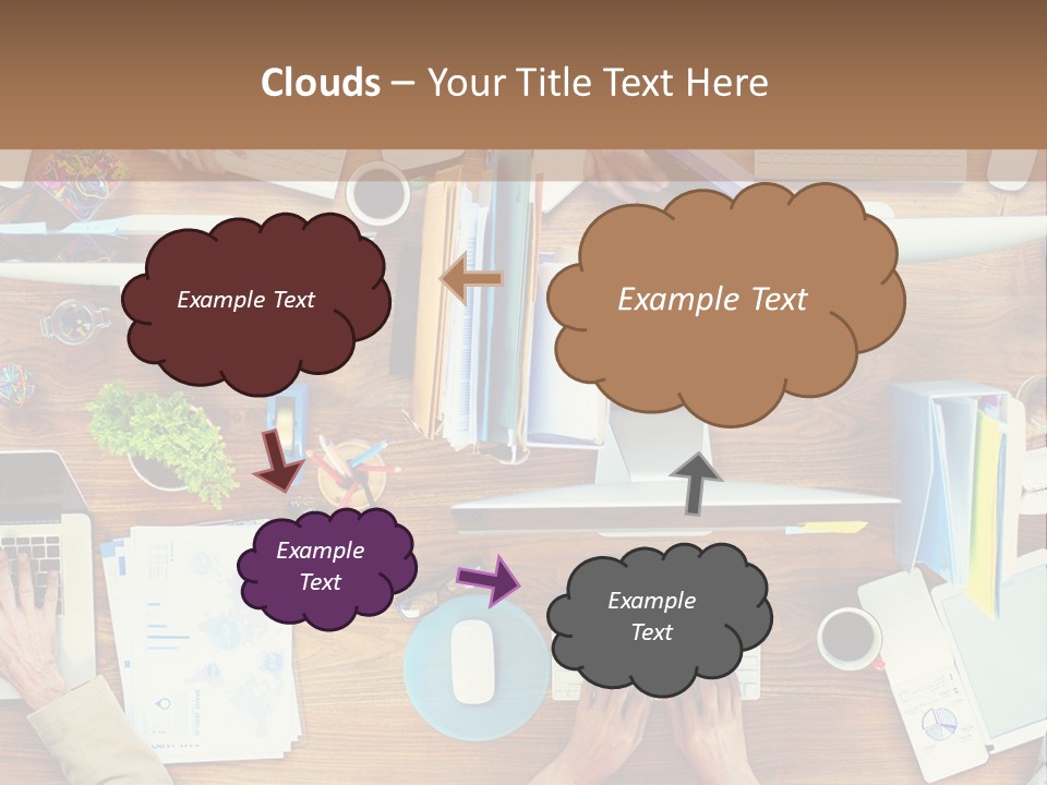 A Group Of People Sitting At A Table Working On Laptops PowerPoint Template