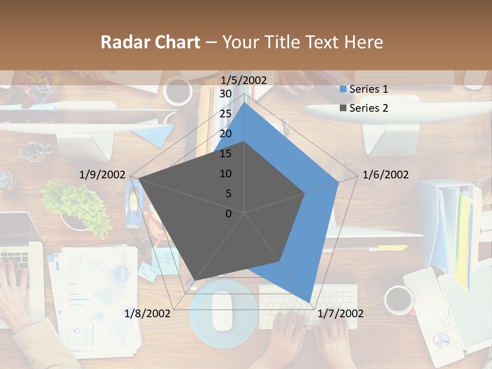 A Group Of People Sitting At A Table Working On Laptops PowerPoint Template