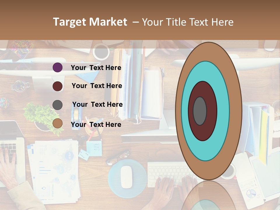 A Group Of People Sitting At A Table Working On Laptops PowerPoint Template