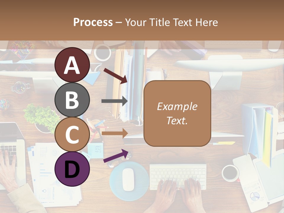 A Group Of People Sitting At A Table Working On Laptops PowerPoint Template