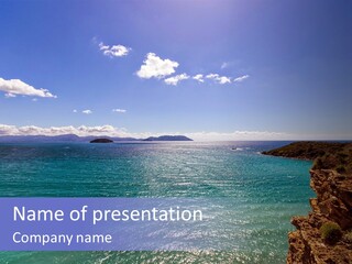 A Large Body Of Water With Mountains In The Background PowerPoint Template