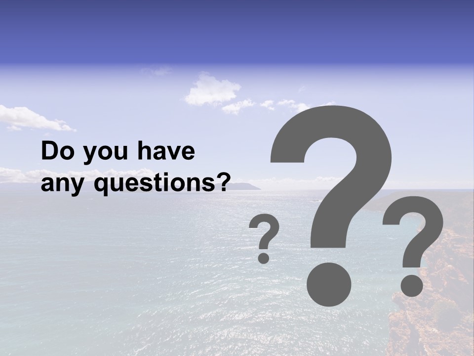 A Large Body Of Water With Mountains In The Background PowerPoint Template