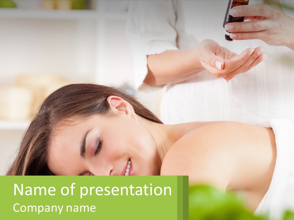 A Woman Getting A Massage With A Bottle Of Wine PowerPoint Template