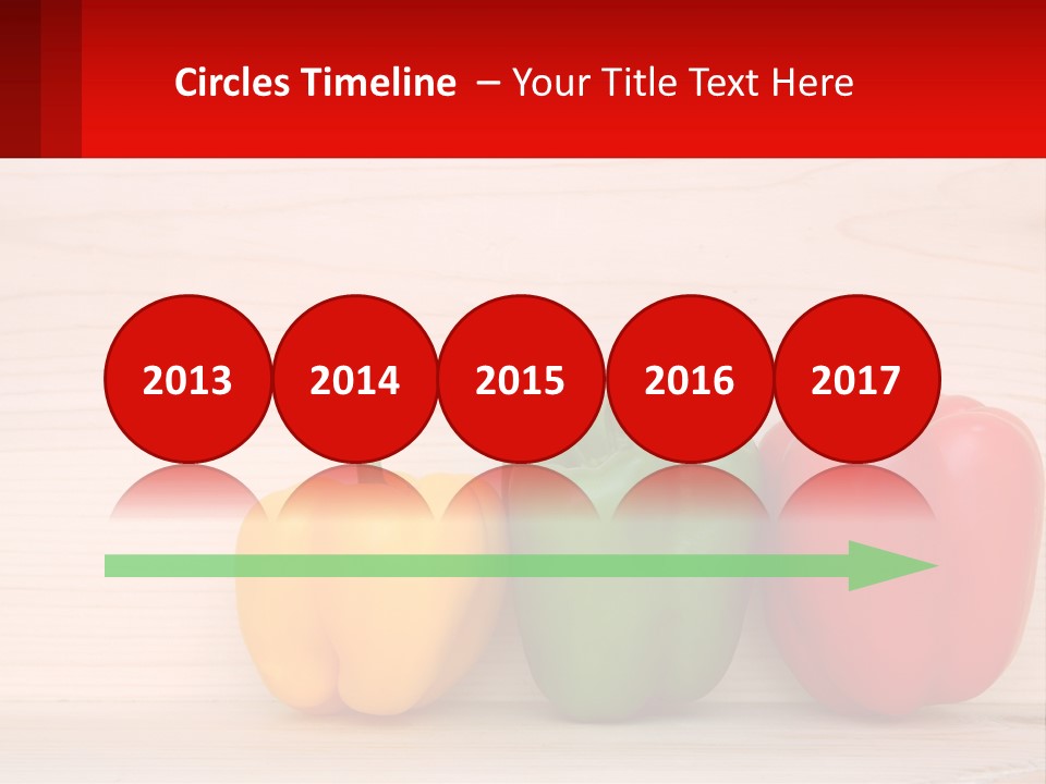 A Row Of Peppers Sitting On Top Of A Wooden Table PowerPoint Template