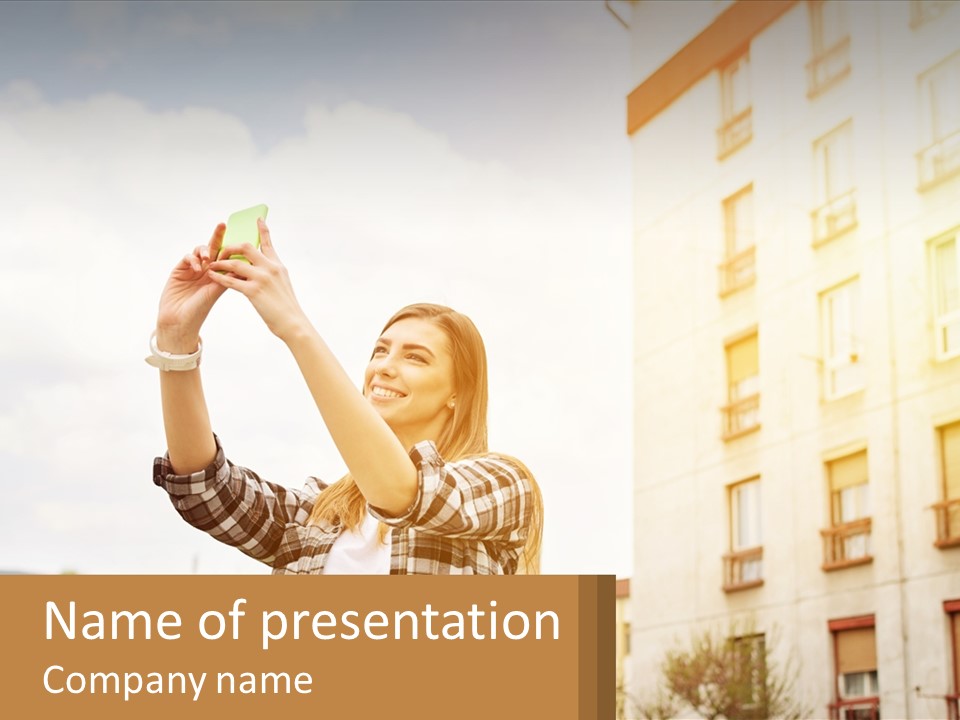 A Woman Taking A Picture With Her Cell Phone PowerPoint Template