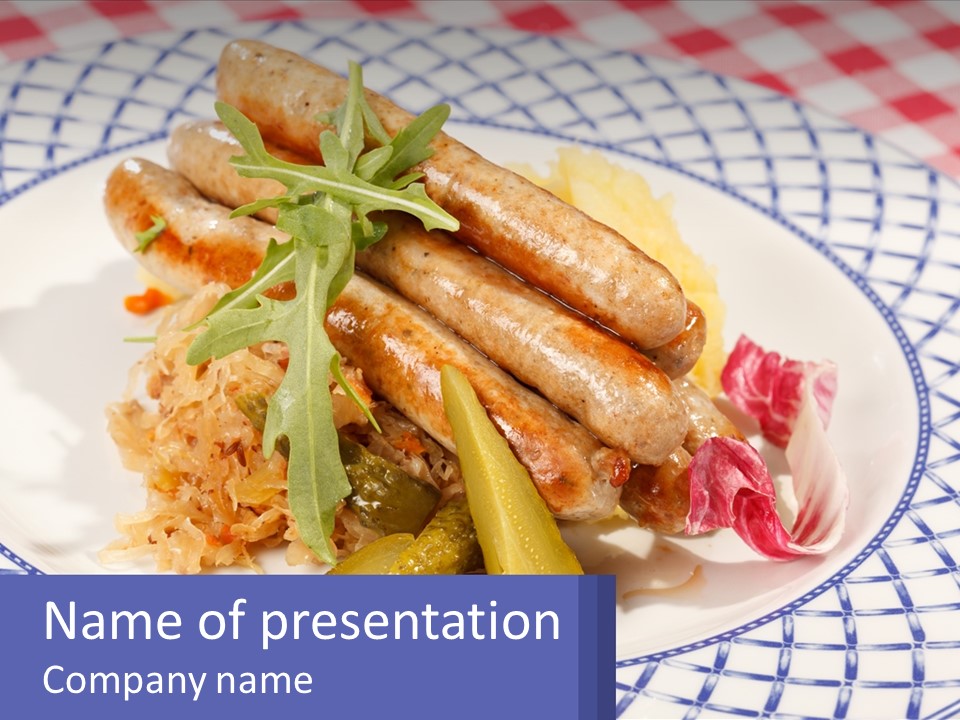 A Plate Of Food With Sausages And Vegetables On It PowerPoint Template