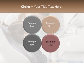 A Young Girl Getting Her Teeth Checked By A Dentist PowerPoint Template