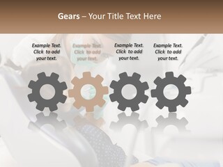 A Young Girl Getting Her Teeth Checked By A Dentist PowerPoint Template