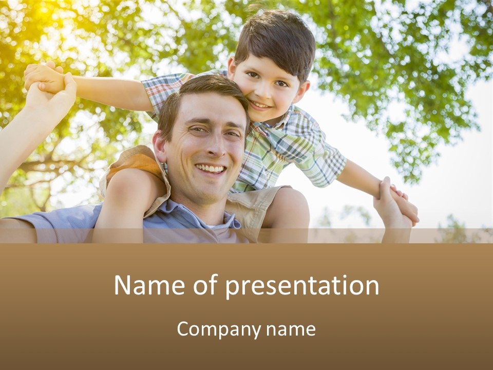 A Man Holding A Young Boy On His Shoulders PowerPoint Template