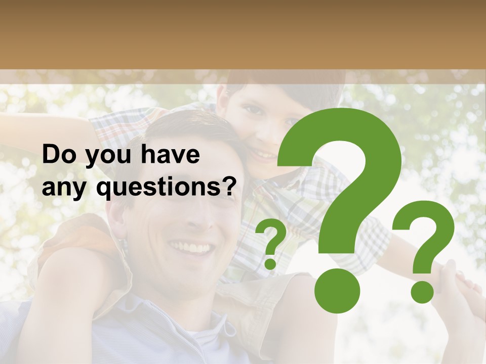 A Man Holding A Young Boy On His Shoulders PowerPoint Template