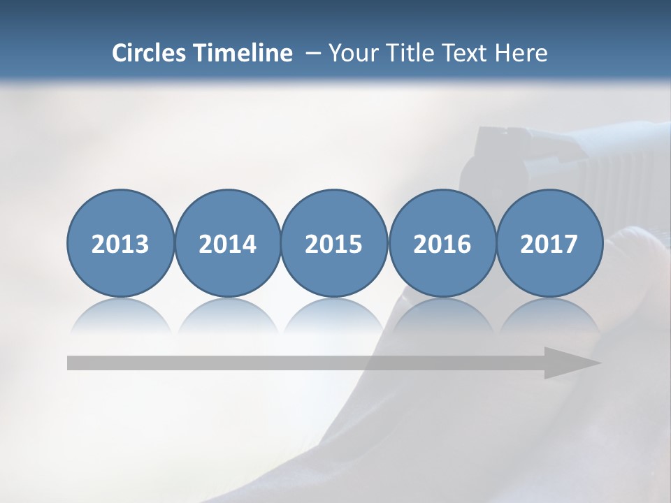 A Person Holding A Gun In Their Hand PowerPoint Template