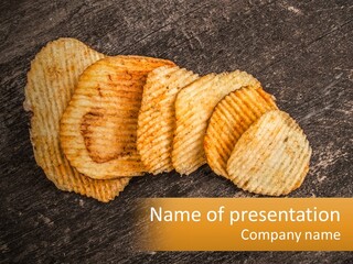 A Pile Of Potato Chips Sitting On Top Of A Wooden Table PowerPoint Template