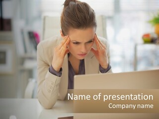 A Woman Sitting In Front Of A Laptop Computer PowerPoint Template