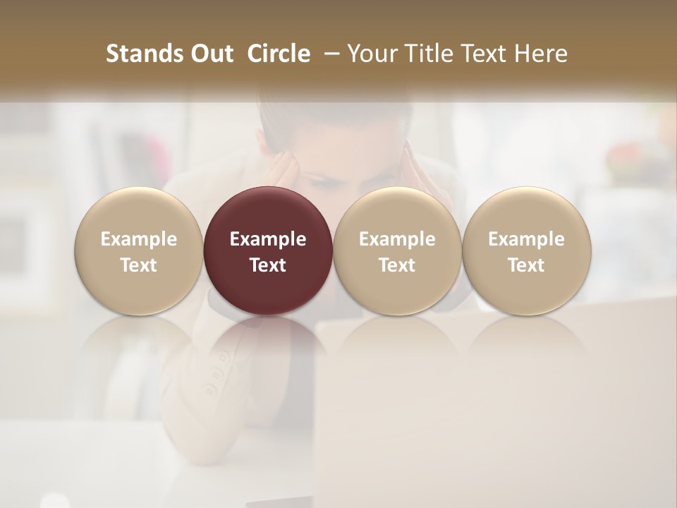 A Woman Sitting In Front Of A Laptop Computer PowerPoint Template