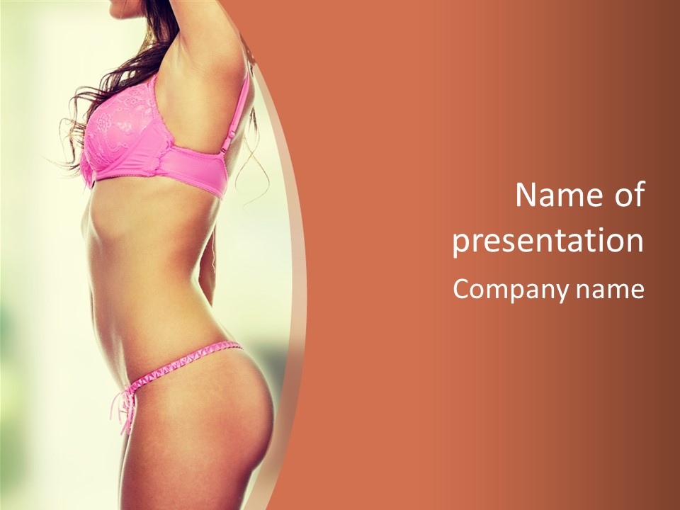 A Beautiful Woman In A Pink Bikini Posing For The Camera PowerPoint Template