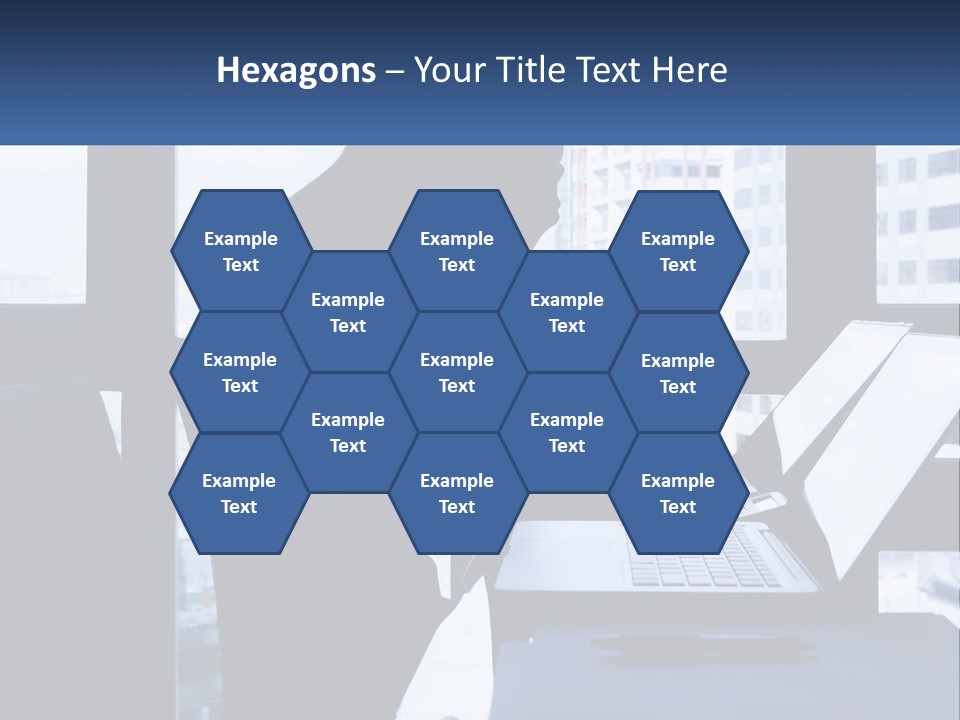 A Man Sitting In Front Of A Laptop Computer PowerPoint Template