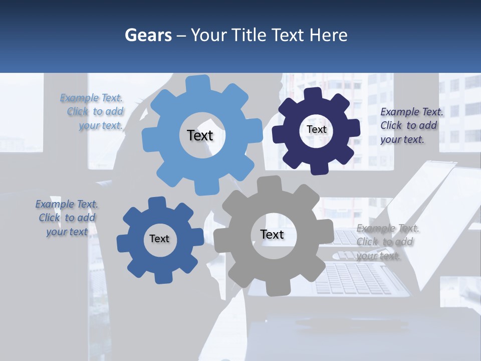 A Man Sitting In Front Of A Laptop Computer PowerPoint Template