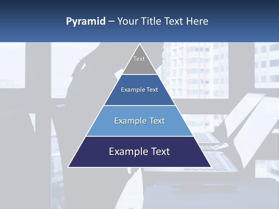 A Man Sitting In Front Of A Laptop Computer PowerPoint Template