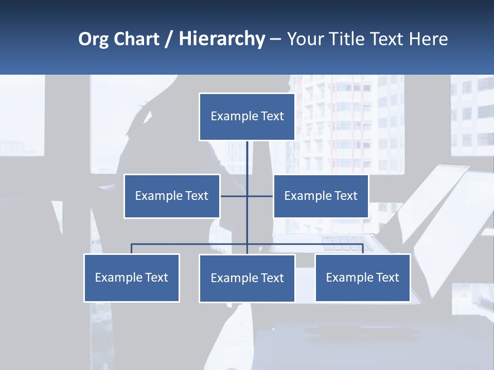 A Man Sitting In Front Of A Laptop Computer PowerPoint Template