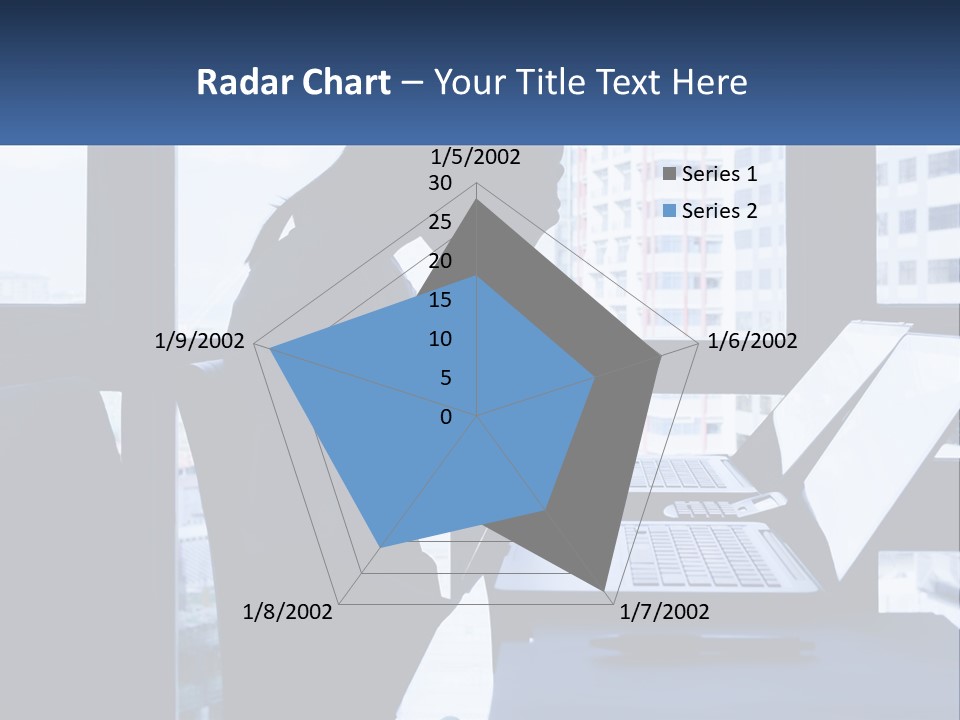 A Man Sitting In Front Of A Laptop Computer PowerPoint Template