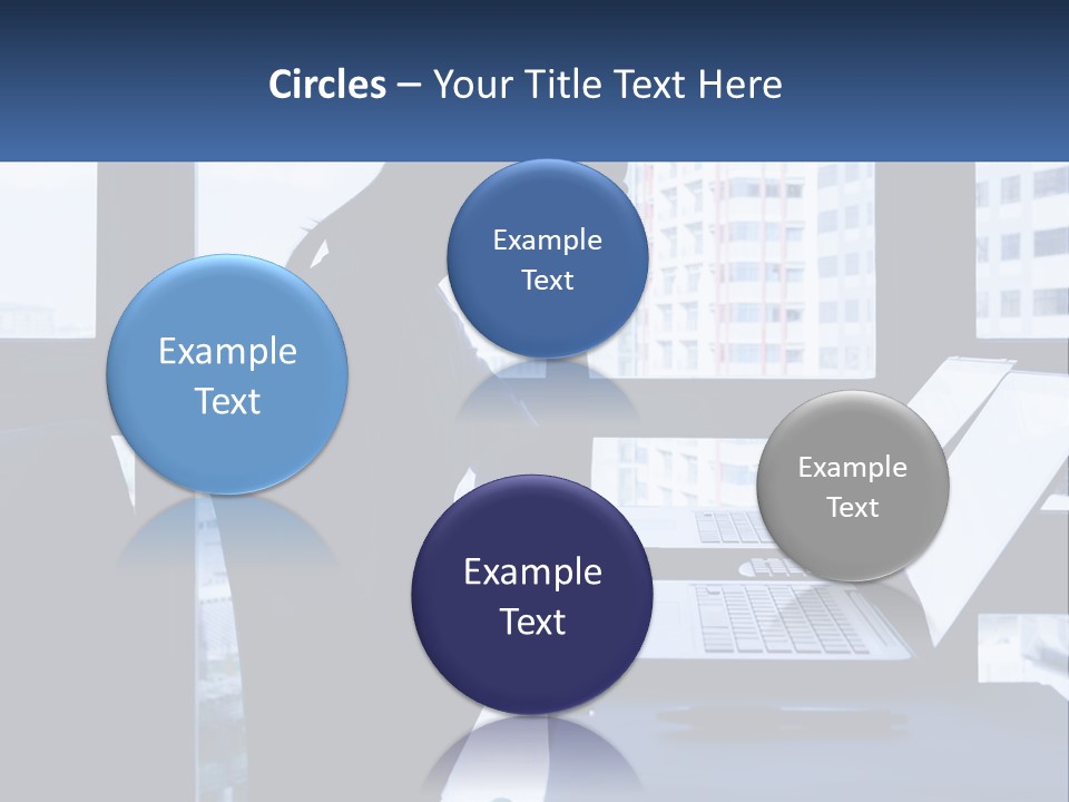 A Man Sitting In Front Of A Laptop Computer PowerPoint Template