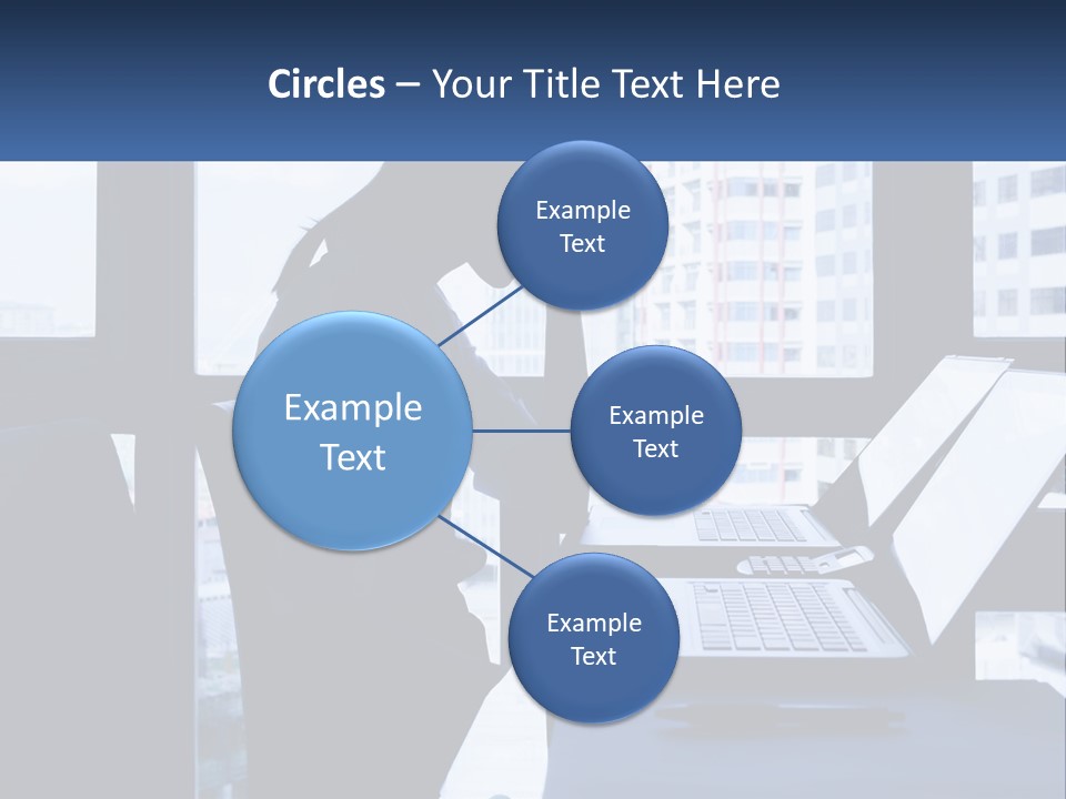 A Man Sitting In Front Of A Laptop Computer PowerPoint Template