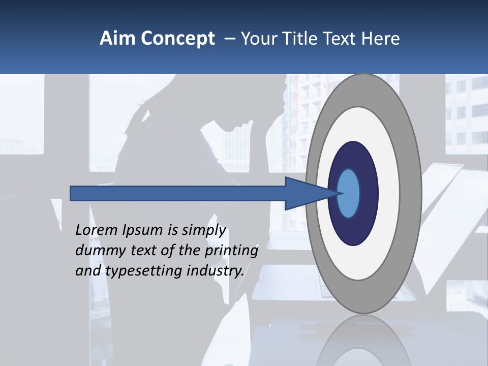 A Man Sitting In Front Of A Laptop Computer PowerPoint Template