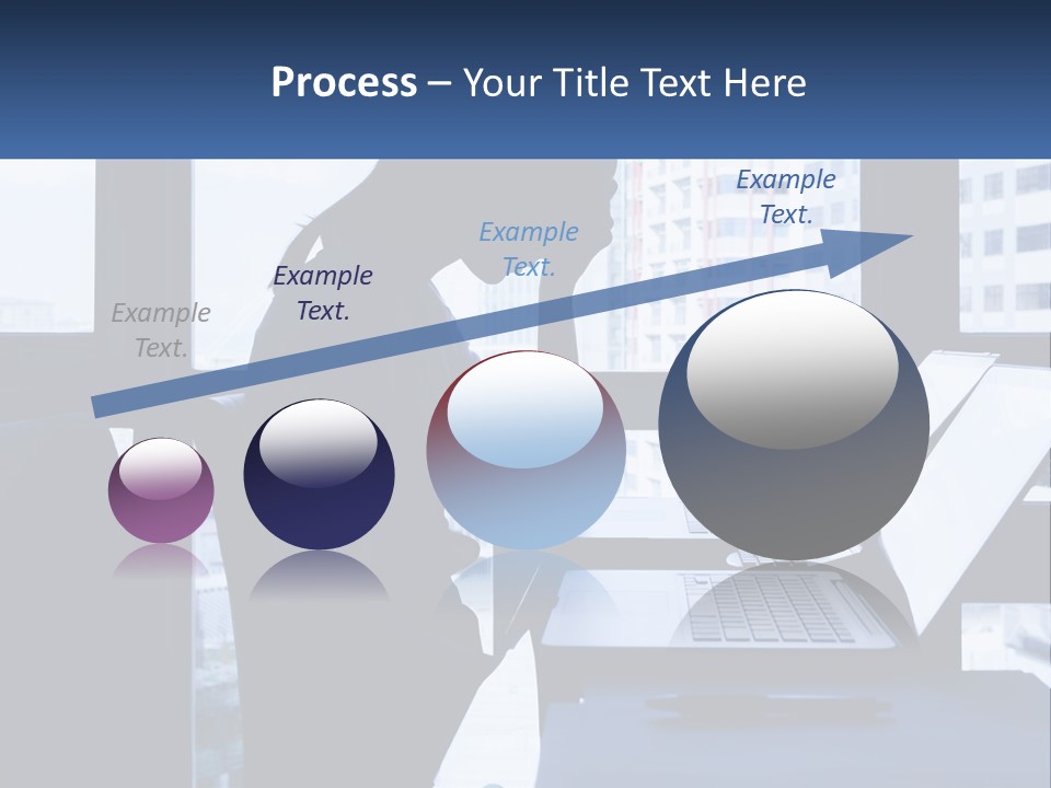 A Man Sitting In Front Of A Laptop Computer PowerPoint Template