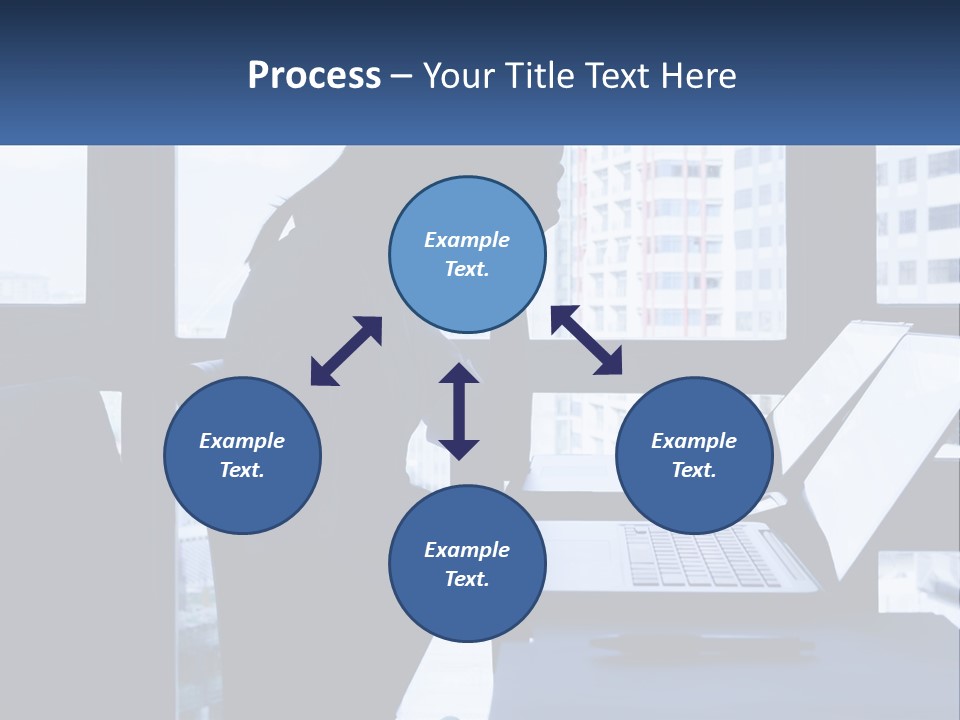 A Man Sitting In Front Of A Laptop Computer PowerPoint Template