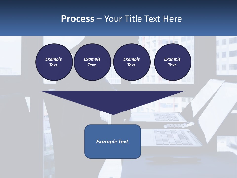 A Man Sitting In Front Of A Laptop Computer PowerPoint Template