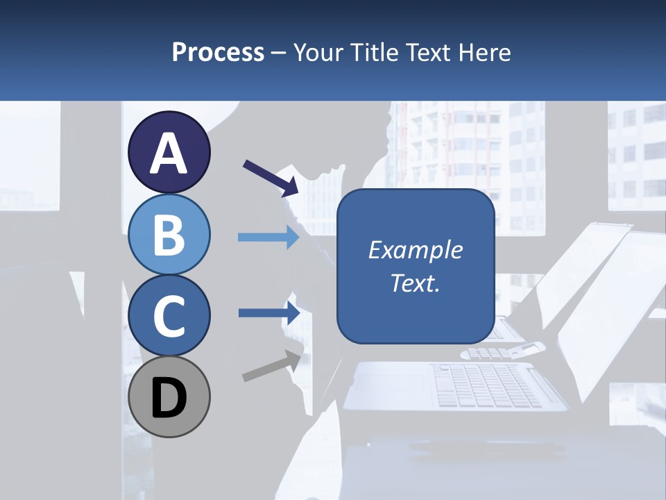 A Man Sitting In Front Of A Laptop Computer PowerPoint Template