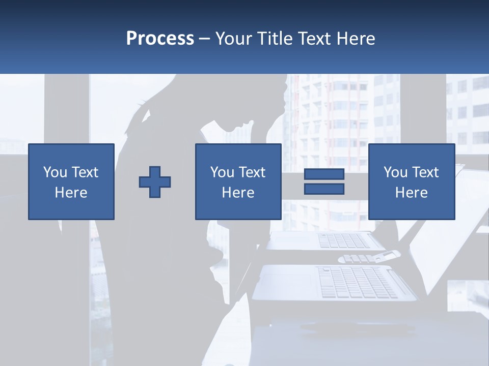 A Man Sitting In Front Of A Laptop Computer PowerPoint Template