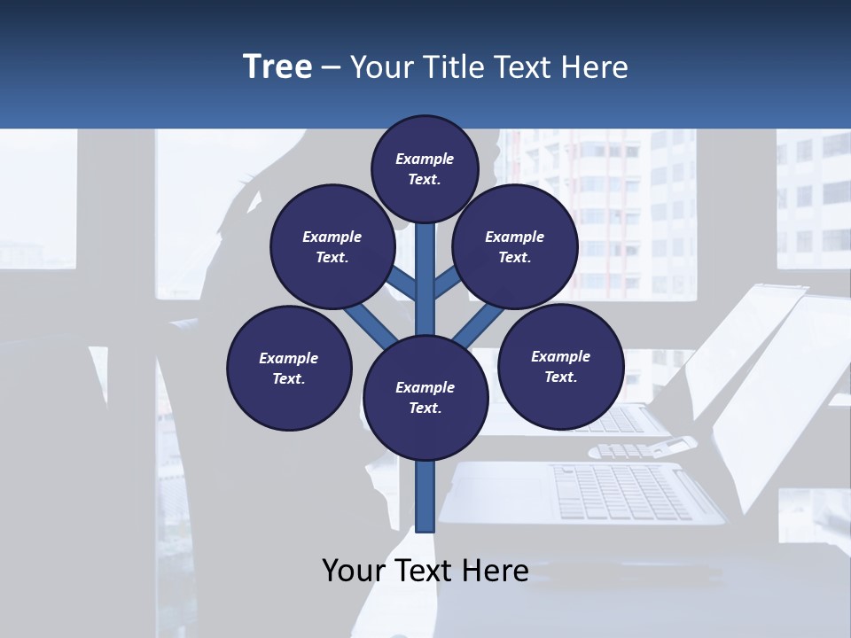 A Man Sitting In Front Of A Laptop Computer PowerPoint Template