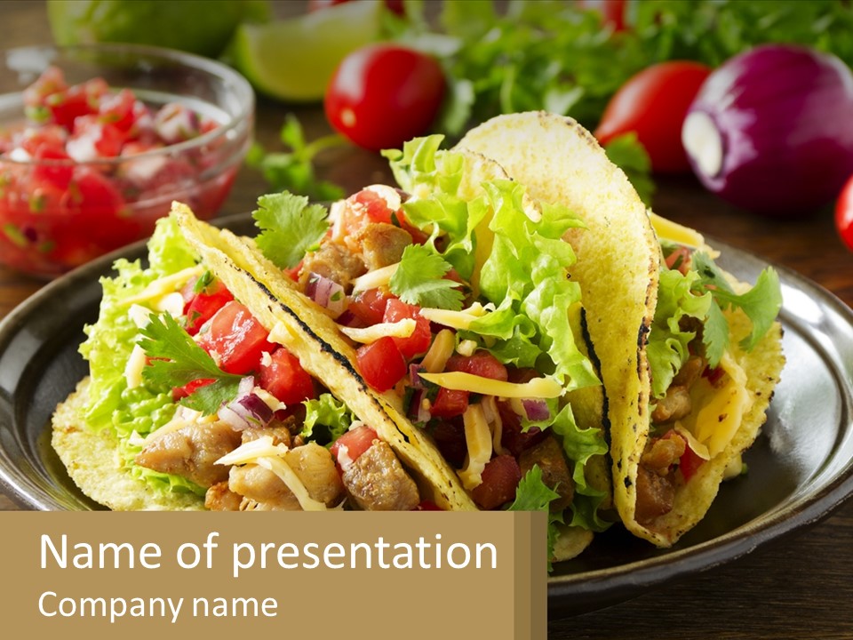A Plate Of Tacos With Lettuce And Tomatoes PowerPoint Template