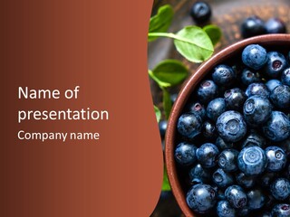 A Bowl Of Blueberries On A Table With Leaves PowerPoint Template